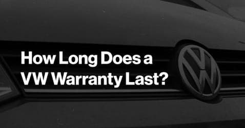 The article title over a Volkswagen car bumper, with a gray overlay.