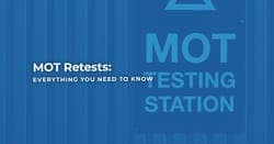 The article title over a sign for an MOT testing station, in a blue overlay.