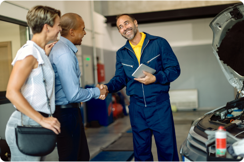 Man shaking hands with customers